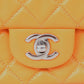 ⁠Bolsa Chanel Mini Flap Laranja