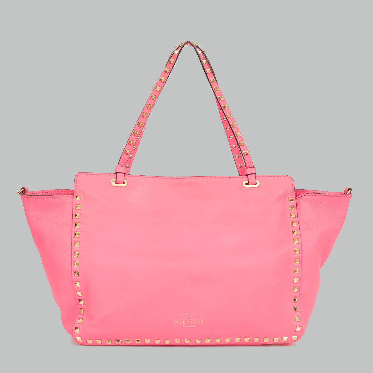 ⁠Bolsa Valentino Rockstud Grainy Rosa Neon