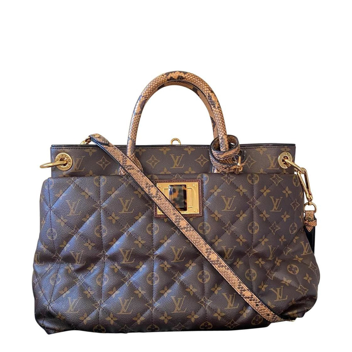 Bolsa Louis Vuitton Etolie Monogram Ostrich Grande